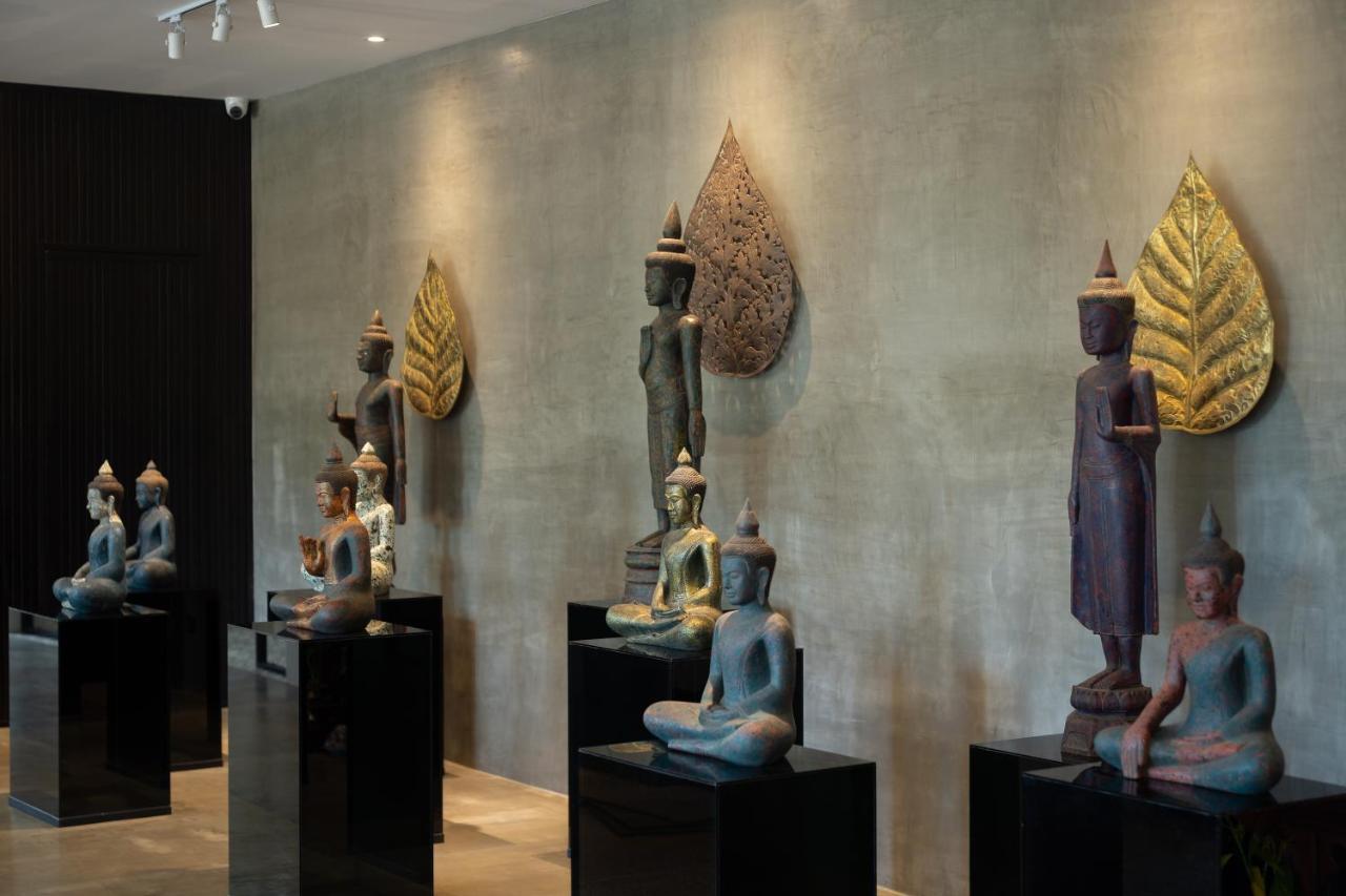 Eightfold Urban Resort Siem Reap Eksteriør billede A collection of Thai and Laotian art