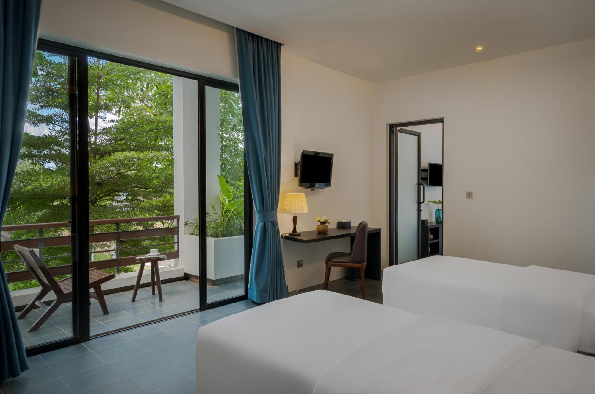 Eightfold Urban Resort Siem Reap Værelse billede Deluxe Room